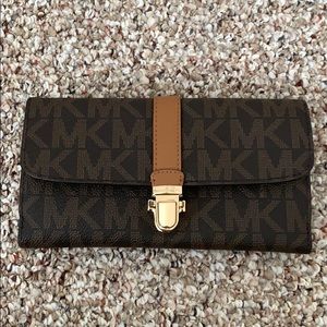 Michael Kors authentic wallet from an MK store.